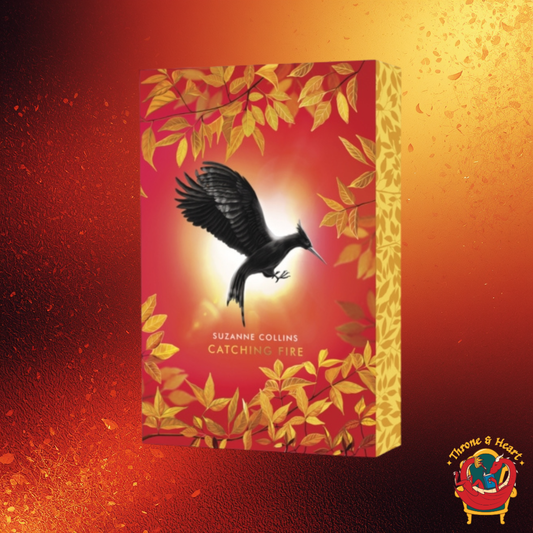 Catching Fire; Suzanne Collins | Paperback Deluxe Sprayed Edge Edition (The Hunger Games Book 2)